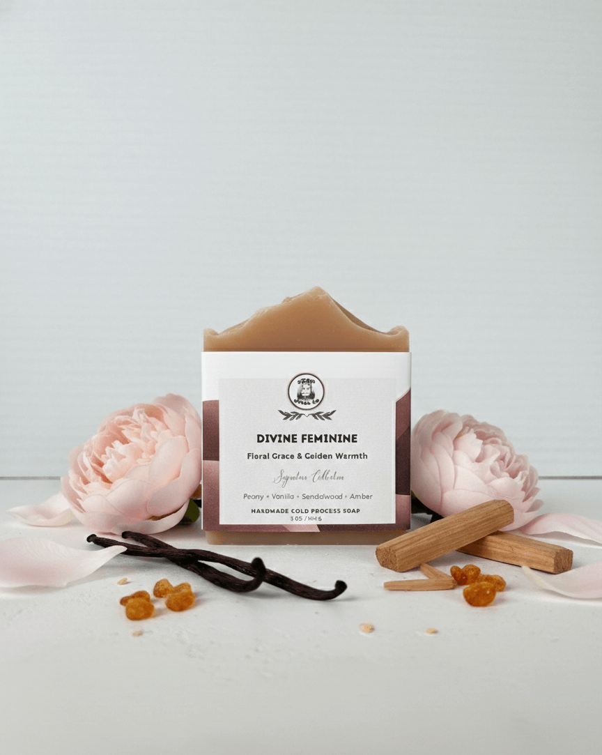 Bar of soap with a vanilla bean and flowers on a white background