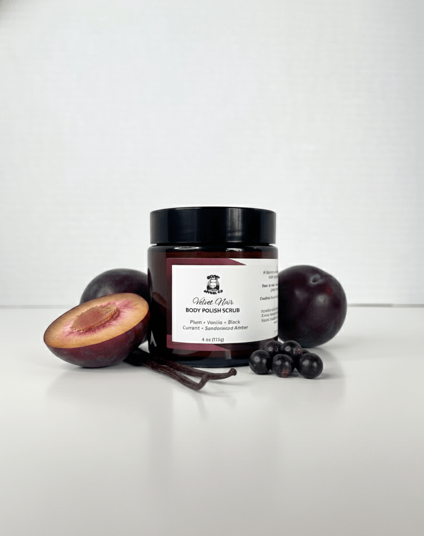 Jar of body polish scrub with plums and vanilla beans on a white background