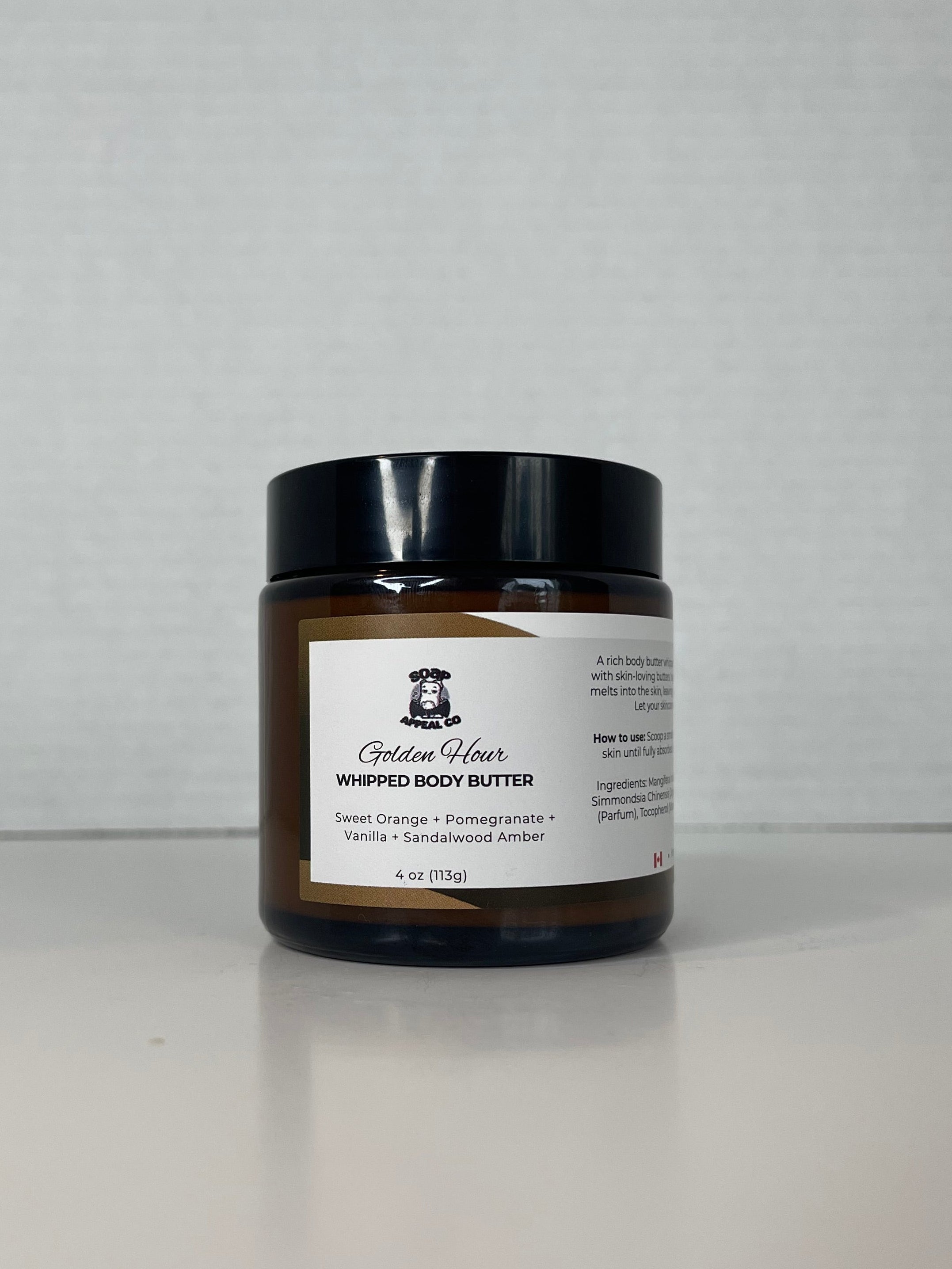 Small jar with a label on a light gray background