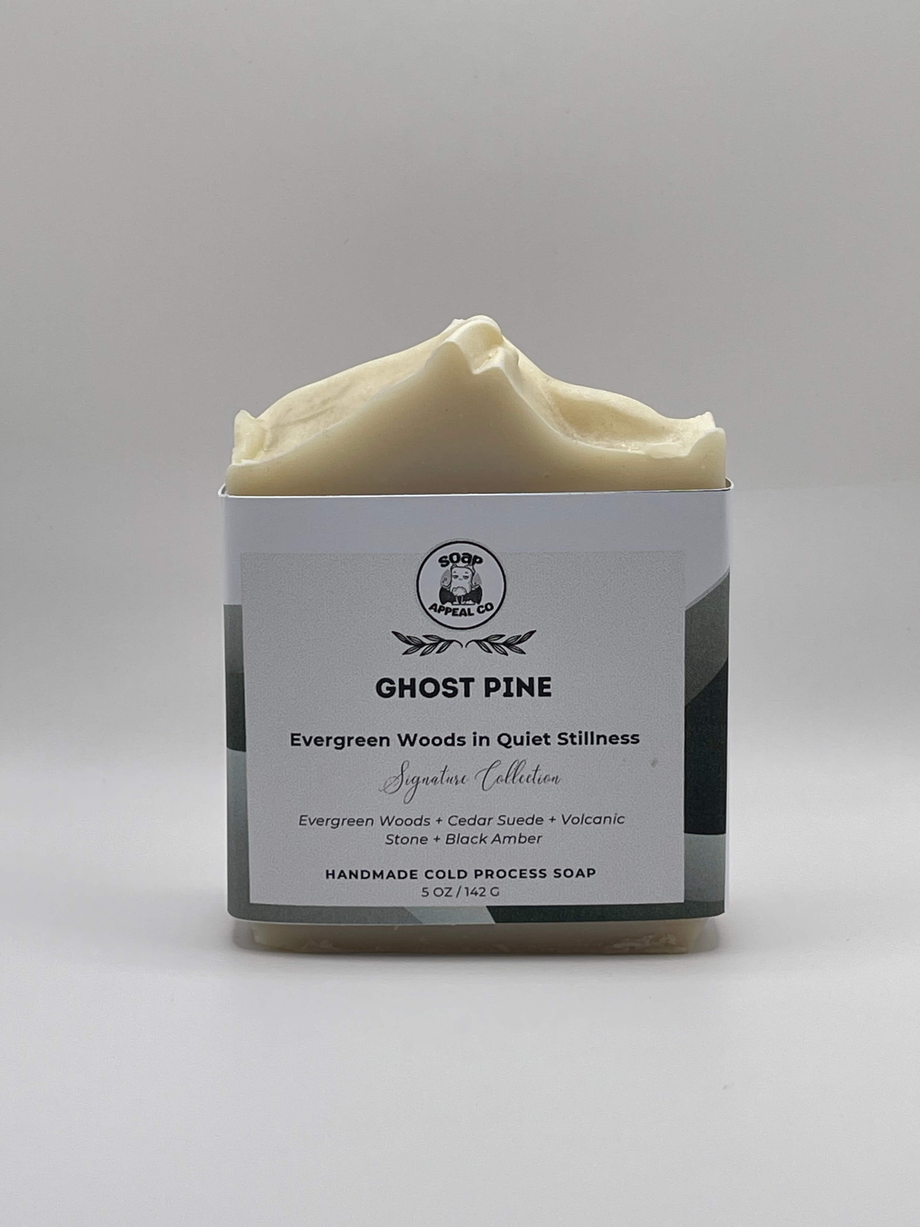 Bar of soap with a label on a gray background