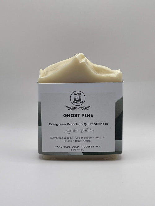 Bar of soap with a label on a gray background